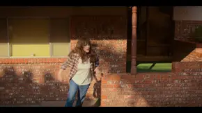 "Hey, drive slow!"-Joyce watching the kids drive off to school.