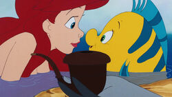 Ariel and Flounder when Scuttle introduces the "snarfblatt".