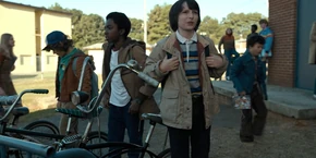 The next day, Lucas, Mike, and Dustin arrive at their school where they're surprised to see Will is not there.