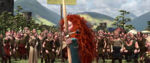 Merida shooting her arrow into Wee Dingwall's target.