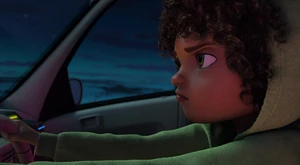 Tip driving with her hood up.