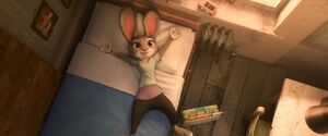 Judy relaxes in her new apartment