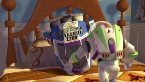 Buzz runs to his cardboard spaceship