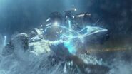 Gipsy Danger rips off the EMP organ from Leatherback as they fight in the harbor.