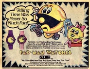 Paxxon, Pac-Man and Ms. Pac-Man watches newspaper ad