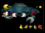 King Galaxian, confronting Pac-Man. Two of his eyes are damaged and one is destroyed.