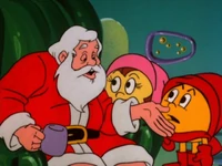 Santa explaining Christmas to the locals of Pacland.