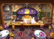 The battle mini-game "Pizza Party" in progress. Players play mini-games to steal castles or earn extra Power Cookies.