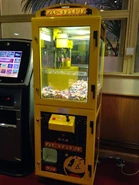 A Pac-Grab Jr. machine; seemingly converted to have a candy claw.