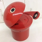 A red Pac-Man Bank, released in 1974