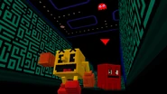 Pac-Man in the maze being chased by Blinky.