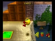 Pac-Man jumping out of the first body of water in the game.