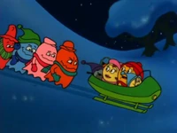 The ghosts chasing the Pac-Family in their toboggan.