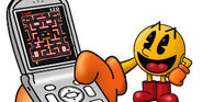 Pac-Man holding a phone.