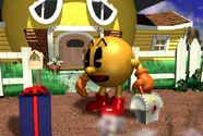 Pac-Man finding Professor Pac-Man's present in Pac-Man World.