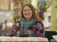 Miss Kitts at the newsstand