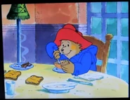 Paddington having his breakfast