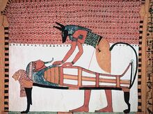 Anubis attending the mummy of Sennedjem.jpg