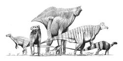 Various ornithopod dinosaurs. Far left: Camptosaurus, left: Iguanodon, centre background: Shantungosaurus, centre foreground: Dryosaurus, right: Corythosaurus, far right (small): Heterodontosaurus, far right (large): Tenontosaurus.