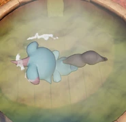 A Depresso relaxing in a Hot Spring by laying in the water face down.