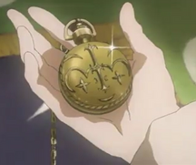 Oz holding Jack's pocket watch