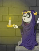 Kamaria holding a candle