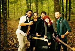 Paramore with Shane Drake on set.