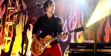Josh Farro playing a Gibson Les Paul Goldtop Electric Guitar.