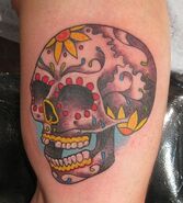 Juan's skull tattoo