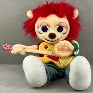 A Lammy plush similar to the Dancing PaRappa plush. Is able to strum guitar.