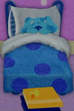 Blue was sleeping in the bed