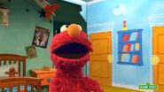 Elmo sings La, La, La, La as part of his Elmo's Wonderful World theme song