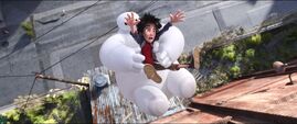 Hiro Hamada and Baymax falls on the Ground