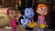 Vampirina holding her baby cousin