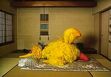 Big Bird sleeps on a futon in Japan