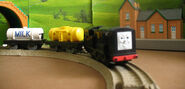 Tomy/Trackmaster Devious Diesel with fuel car and milk wagon