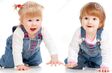 Funny-kids-girls-crawling-floor-25377577