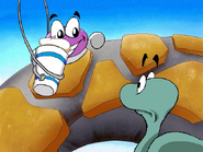 Putt-Putt holding Hot Cocoa