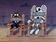 Danger Mouse and Penfold bound and gagged to chairs