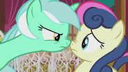 Lyra pressing her muzzle against Sweetie Drops S5E9