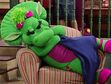 Baby Bop takes a nap with a blue blanket