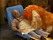 Mr. Hooper and Barkley take a nap on the rooftop in episode 1460