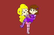 Sally holds Sarah in her arms