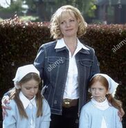 Liliana Mumy and Morgan York as Mary-Kate Oslen & Ashley Oslen (Twin #1 & Twin #2)