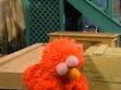 Elmo feels exhausted from singing and takes a nap in Kids Favorite Songs
