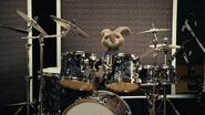 E.B. playing the drums