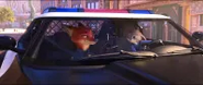 Nick and Judy smirking