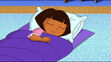 Dora sleeping in Dora's Museum Sleepover Adventure