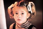 Drew Barrymore as Young Odette