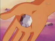 Brock gives Ash the Boulder Badge